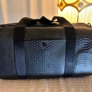 Weekend genuine leather duffel bag python style